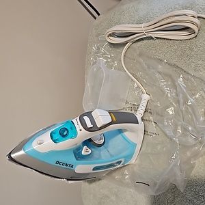 DCENTA stainless steel steam iron  NEW in original packaging.